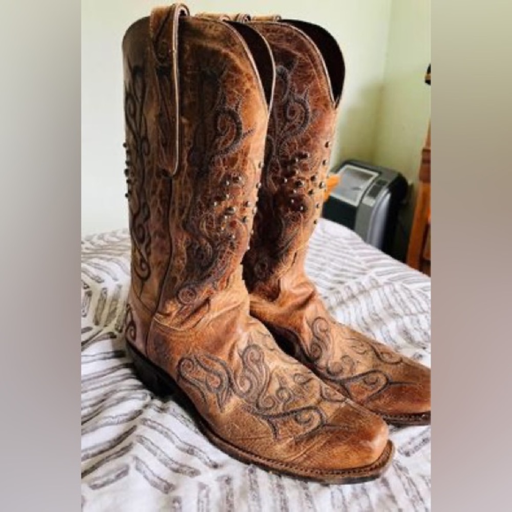 Men’s Size 9.5 boot or Women’s Size 11